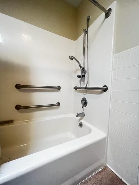 bathroom with shower / washtub combination