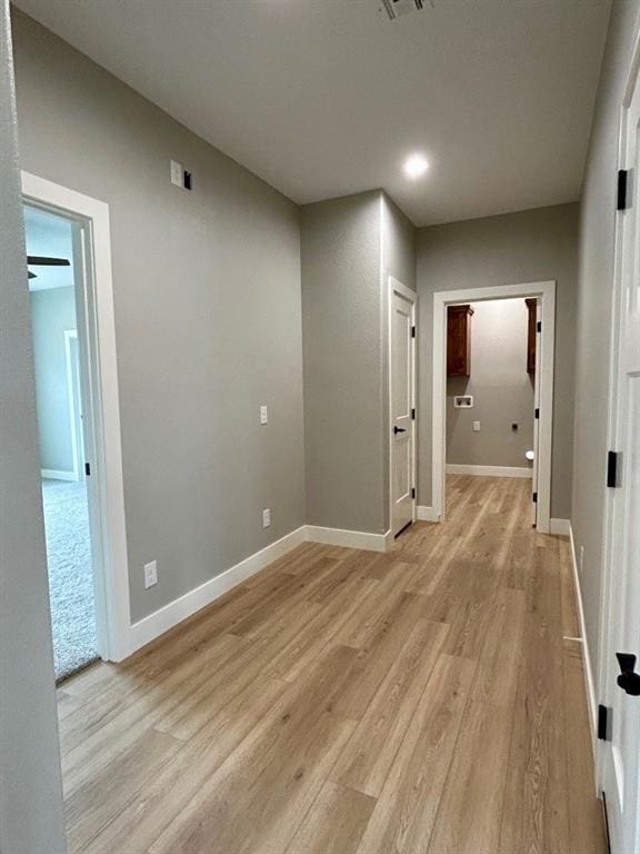 hall featuring light hardwood / wood-style flooring