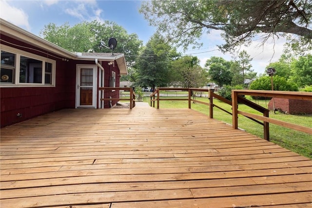 deck featuring a yard