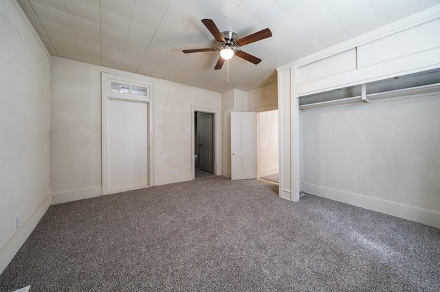 unfurnished bedroom with carpet flooring, ceiling fan, and a closet