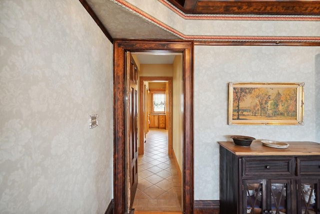 hallway with tile patterned flooring