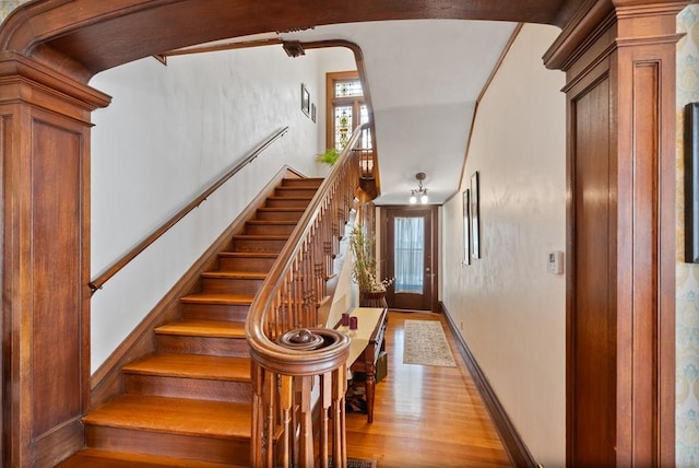 staircase featuring hardwood / wood-style floors