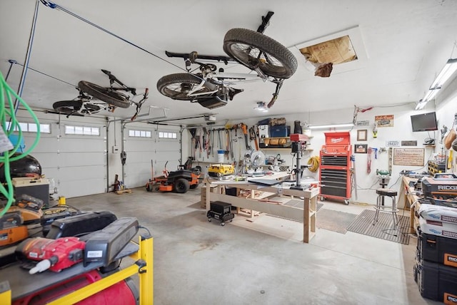 garage with a workshop area