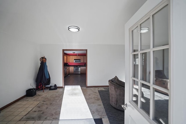 corridor with carpet flooring