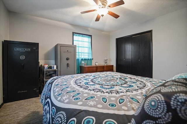 carpeted bedroom with a textured ceiling, a closet, and ceiling fan