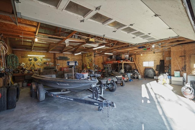 garage with a workshop area