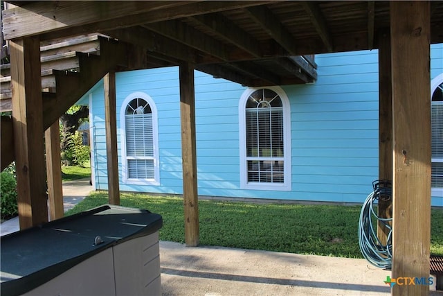68 Silkstocking St, Port Lavaca, TX 77979 - view of home's exterior featuring a yard