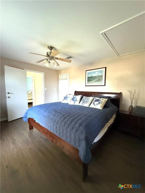 68 Silkstocking St, Port Lavaca, TX 77979 - bedroom with attic access, wood finished floors, and a ceiling fan