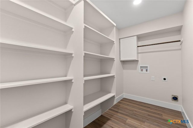 laundry room with washer hookup, laundry area, dark wood-style flooring, electric dryer hookup, and baseboards