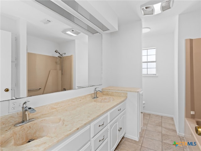 bathroom with visible vents, a sink, and toilet