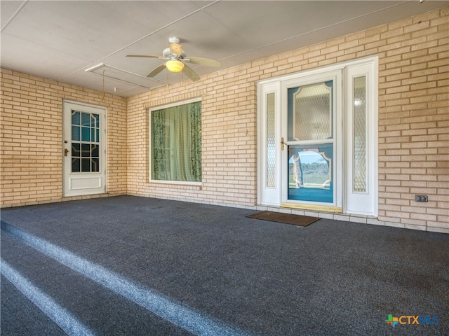 view of patio / terrace with a ceiling fan