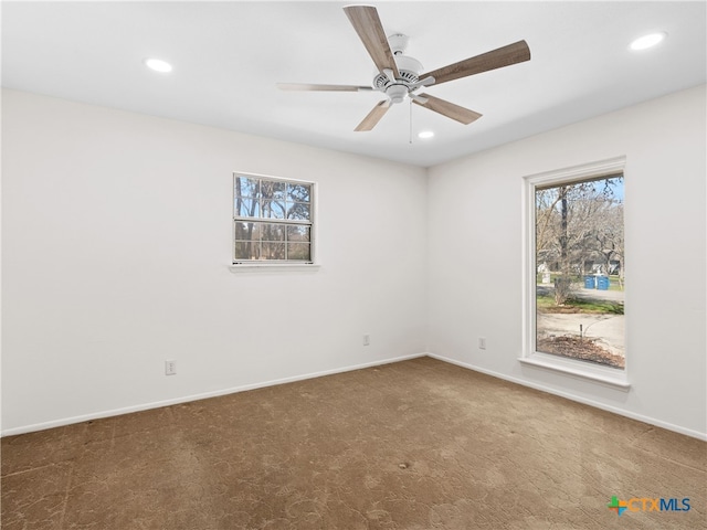 unfurnished room featuring carpet floors, baseboards, a ceiling fan, and recessed lighting