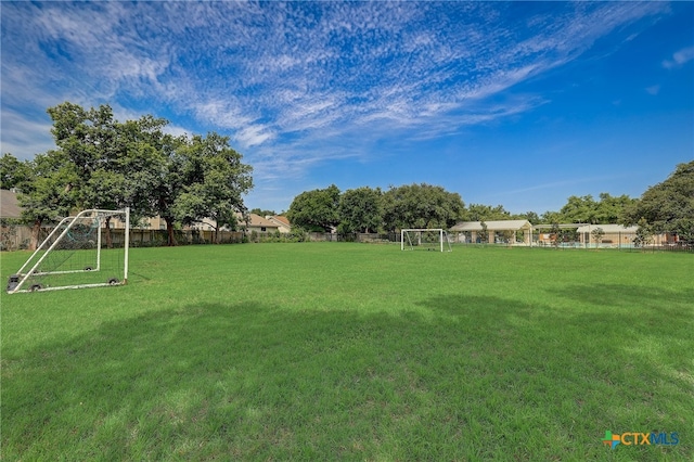 8302 Dove Valley Cv, Austin, TX 78729 - view of yard with an area for soccer
