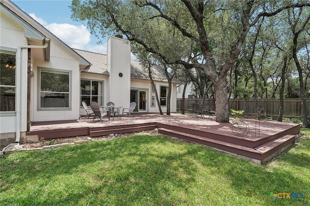 8302 Dove Valley Cv, Austin, TX 78729 - view of yard with a wooden deck