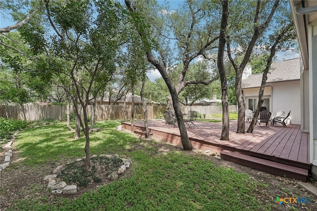 8302 Dove Valley Cv, Austin, TX 78729 - view of yard featuring a deck