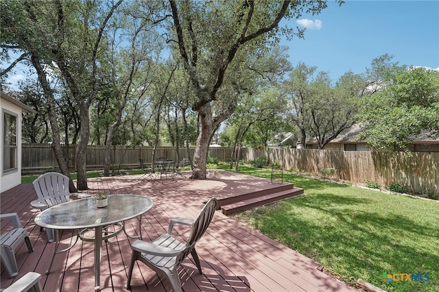 8302 Dove Valley Cv, Austin, TX 78729 - wooden deck featuring outdoor dining area