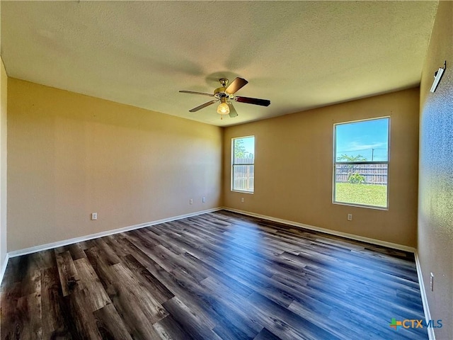 3807 Sunflower Dr, Killeen, TX 76542 - spare room featuring a ceiling fan, a textured ceiling, and dark wood-type flooring