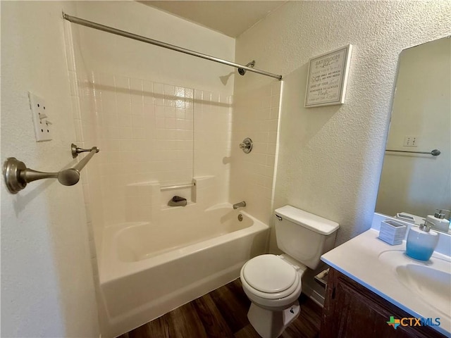 3807 Sunflower Dr, Killeen, TX 76542 - full bathroom with a textured wall, wood finished floors, shower / tub combination, and vanity