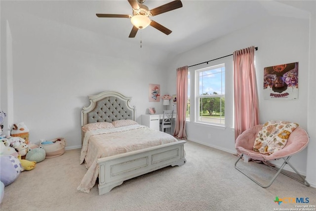 bedroom featuring ceiling fan, light carpet, and lofted ceiling