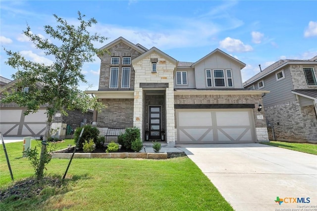 view of front of property with a garage and a front lawn