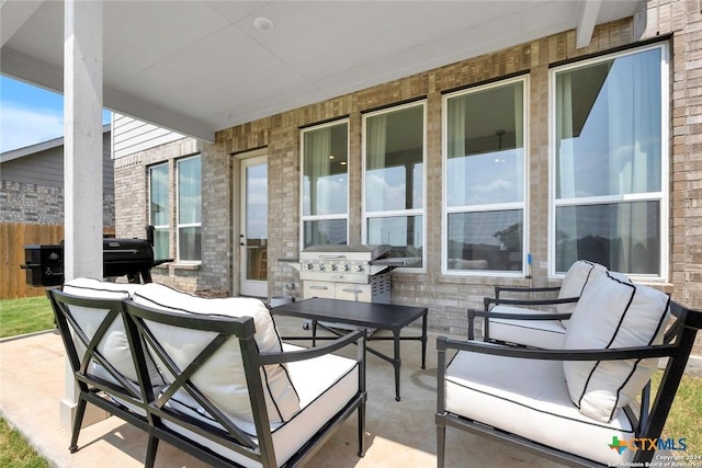 view of patio featuring outdoor lounge area and area for grilling