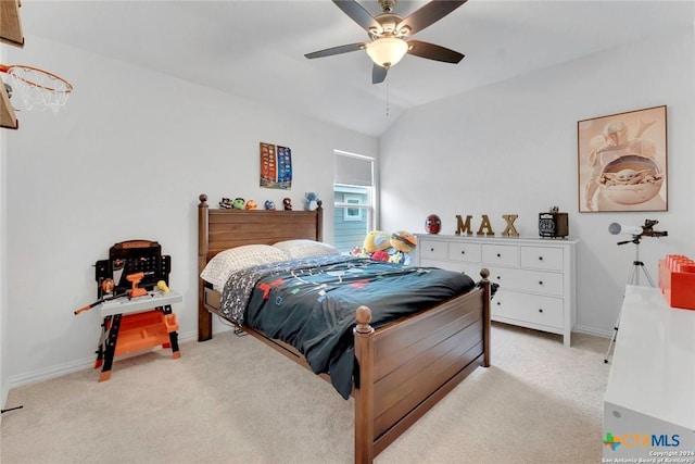 carpeted bedroom featuring ceiling fan and lofted ceiling