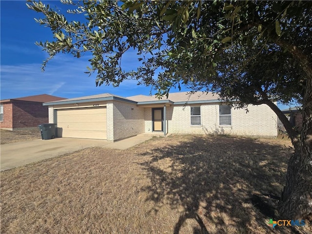 ranch-style home with a garage