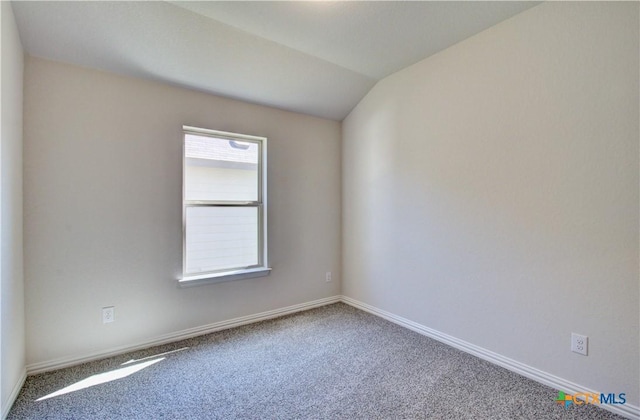 2588 Gideon Ln, New Braunfels, TX 78130 - spare room featuring carpet and lofted ceiling