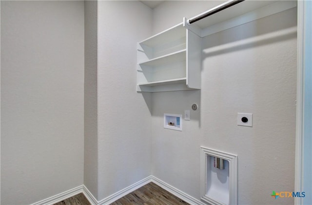 2588 Gideon Ln, New Braunfels, TX 78130 - washroom featuring dark wood-type flooring, hookup for a gas dryer, hookup for a washing machine, and electric dryer hookup