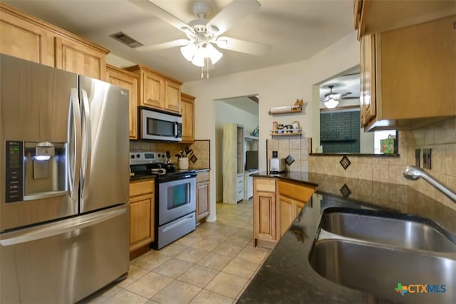 408 Sterling Manor Ct, Temple, TX 76502 - kitchen featuring stainless steel appliances, ceiling fan, decorative backsplash, and light tile patterned floors