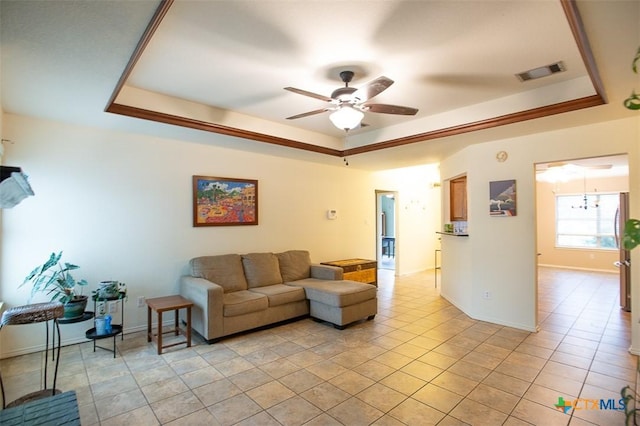 408 Sterling Manor Ct, Temple, TX 76502 - living area featuring a tray ceiling, ceiling fan, and light tile patterned flooring