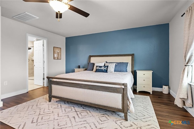 bedroom with a ceiling fan, wood finished floors, visible vents, and baseboards