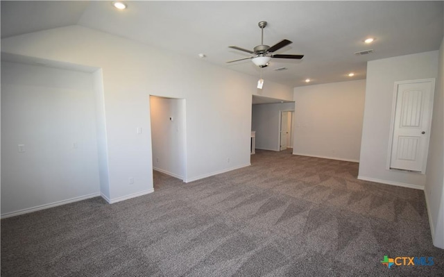 carpeted empty room featuring ceiling fan and lofted ceiling