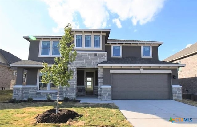 prairie-style home with a garage