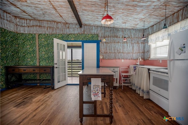 126 Washington Ave, Port Lavaca, TX 77979 - kitchen with white appliances, wood finished floors, and plenty of natural light
