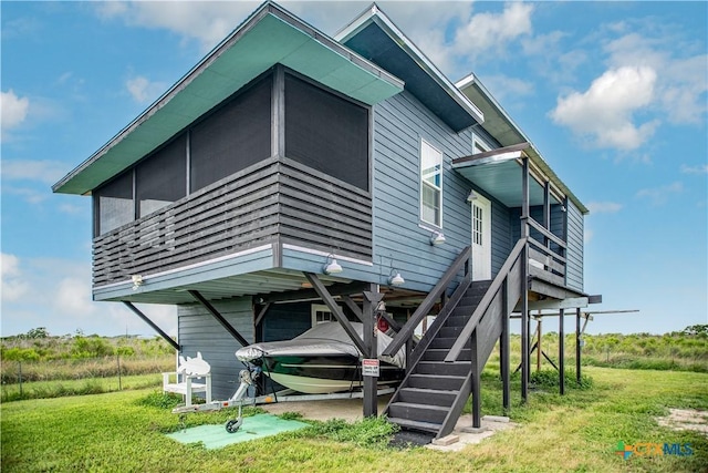 126 Washington Ave, Port Lavaca, TX 77979 - view of side of property featuring a yard and stairway