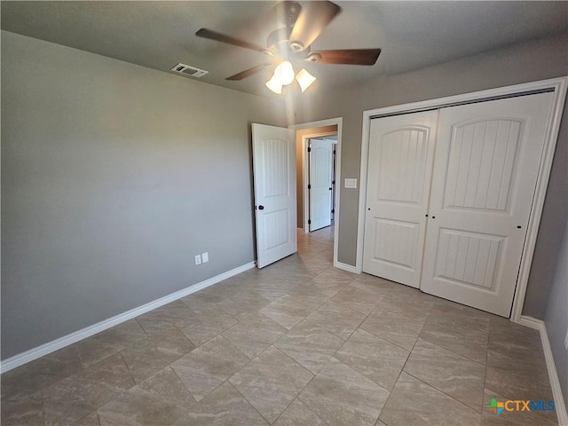 905 Roadrunner Spur, Canyon Lake, TX 78133 - unfurnished bedroom with a closet and ceiling fan
