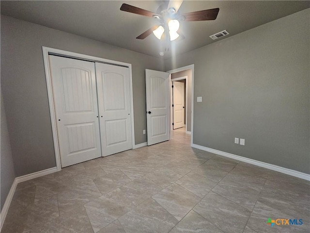 905 Roadrunner Spur, Canyon Lake, TX 78133 - unfurnished bedroom with a closet and ceiling fan