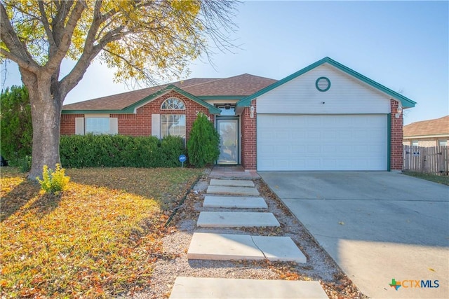 single story home with a garage