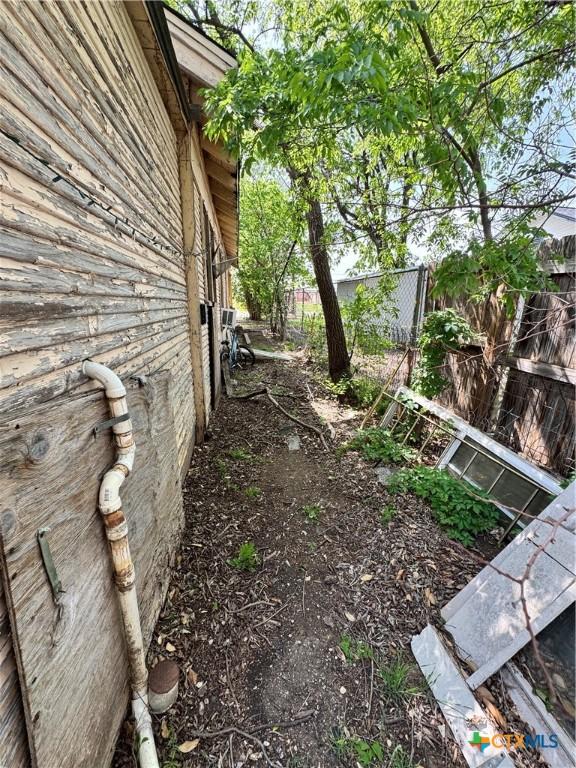 205 S Chestnut, Lampasas, TX 76550 - view of yard featuring fence