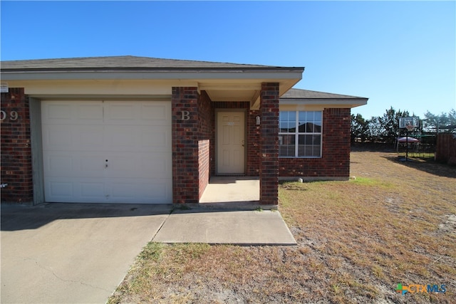 ranch-style house with a garage