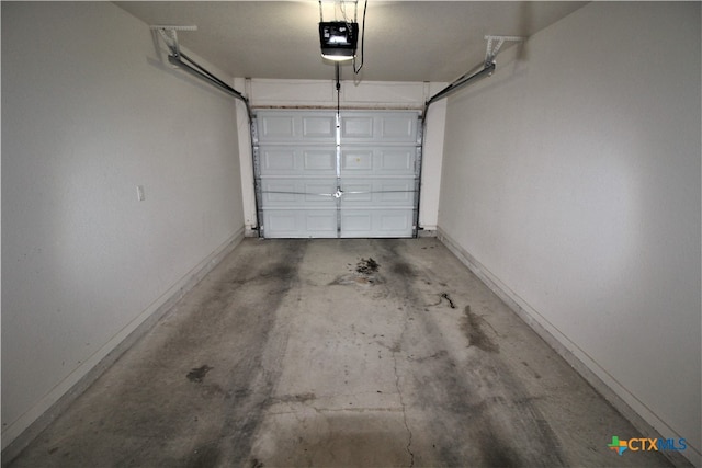 garage featuring a garage door opener