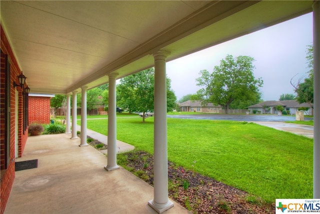 view of patio featuring a porch