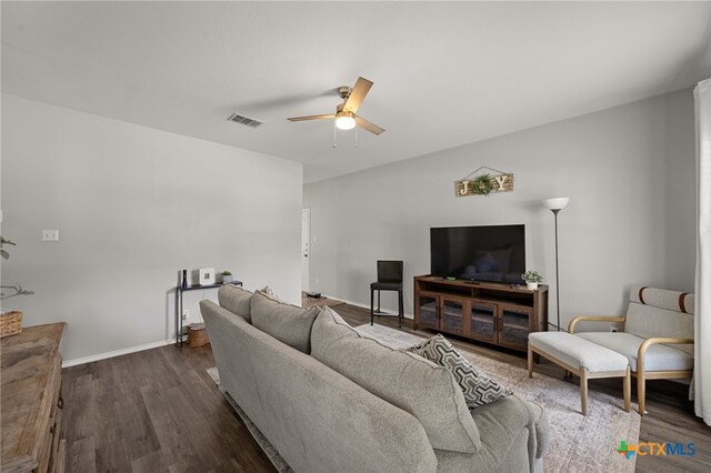 1503 Prather St, Taylor, TX 76574 - living area with ceiling fan and dark wood finished floors