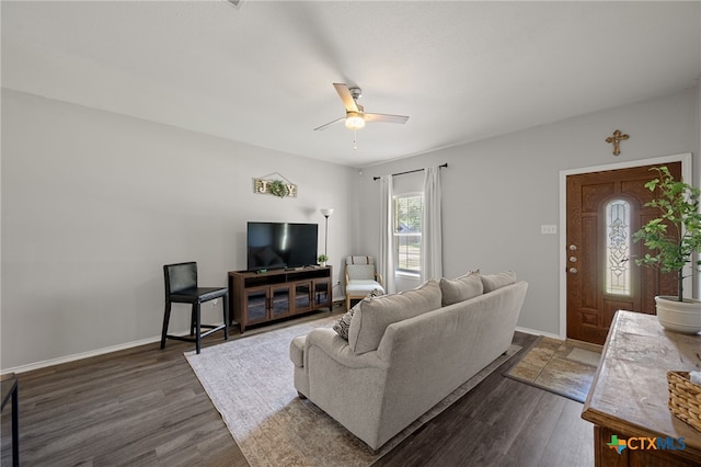 1503 Prather St, Taylor, TX 76574 - living room with a ceiling fan and dark wood-type flooring
