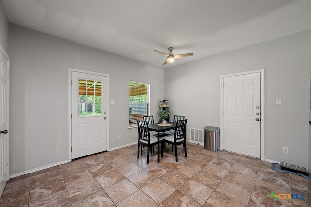 1503 Prather St, Taylor, TX 76574 - dining space featuring ceiling fan and light stone finish flooring
