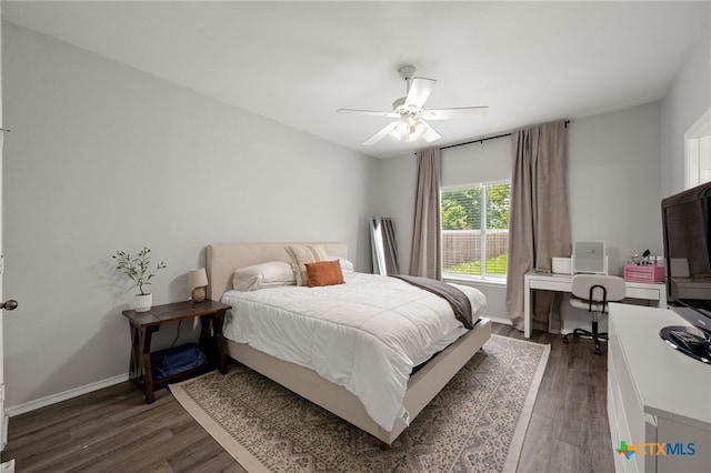 1503 Prather St, Taylor, TX 76574 - bedroom featuring dark wood-style flooring, a desk, and ceiling fan