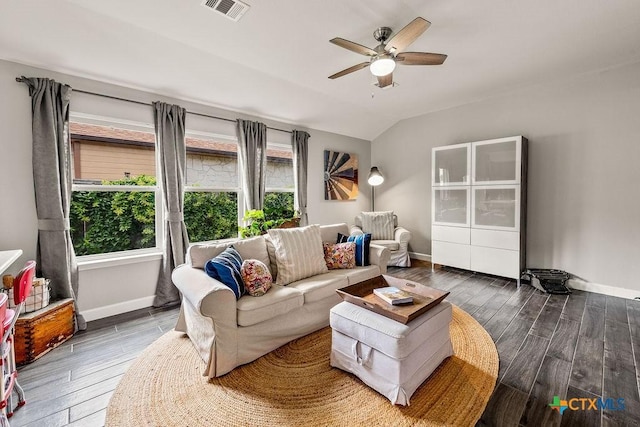 2075 Sungate Dr, New Braunfels, TX 78130 - living area featuring healthy amount of natural light, a ceiling fan, vaulted ceiling, and wood finished floors