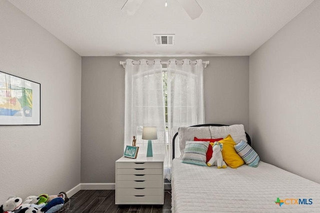 2075 Sungate Dr, New Braunfels, TX 78130 - bedroom featuring dark wood finished floors and ceiling fan