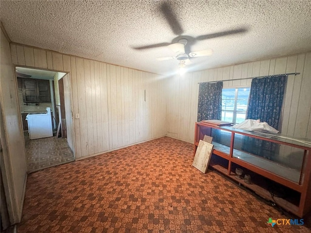 1606 Milam Dr, Victoria, TX 77901 - bedroom featuring wood walls and a ceiling fan